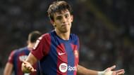 Joao Felix celebrates scoring a goal for Barcelona.